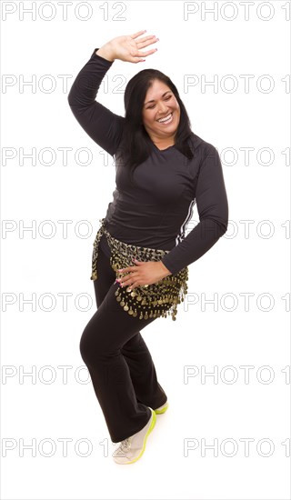 Attractive hispanic woman zumba dancing on a white background