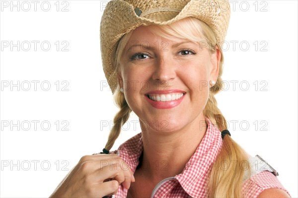 Attractive blond with cowboy hat isolated on a white background