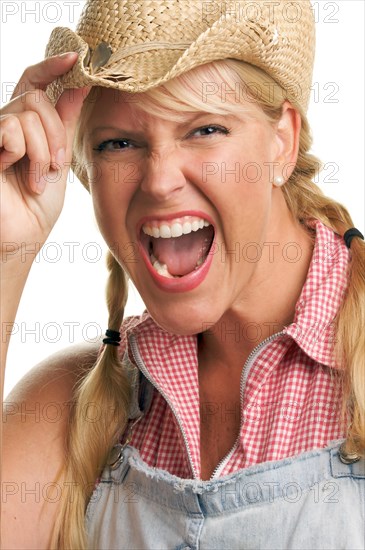 Attractive blond with cowboy hat isolated on a white background