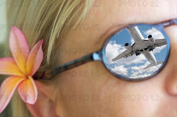 Relaxing girl wearing sunglasses