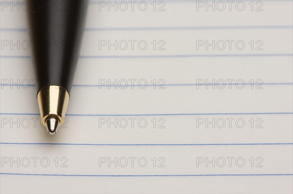 Pen and pad of lined paper