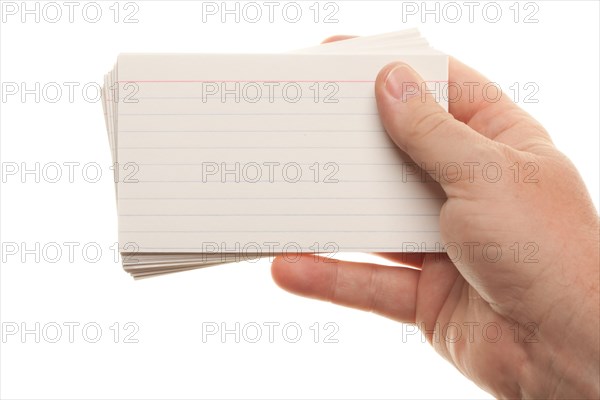Male hand holding stack of flash cards isolated on a white background