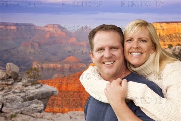 Happy affectionate couple at the grand canyon lookout point