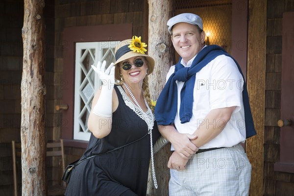 Young attractive couple dressed in outfits from the twenties era