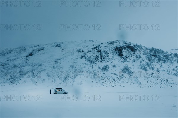 Camper in winter landscape