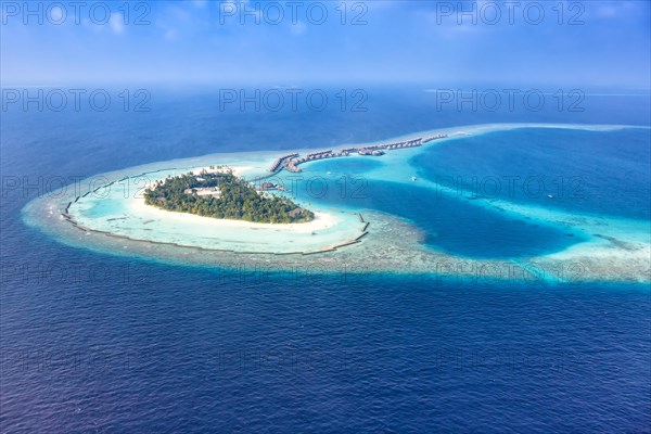 Maldives island holiday sea panorama text free space copyspace Halaveli Resort Ari Atoll aerial photo tourism