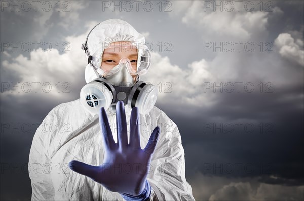 Chinese woman wearing hazmat suit