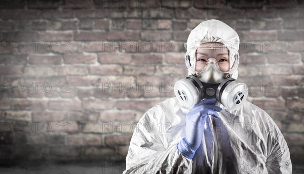 Chinese woman wearing hazmat suit