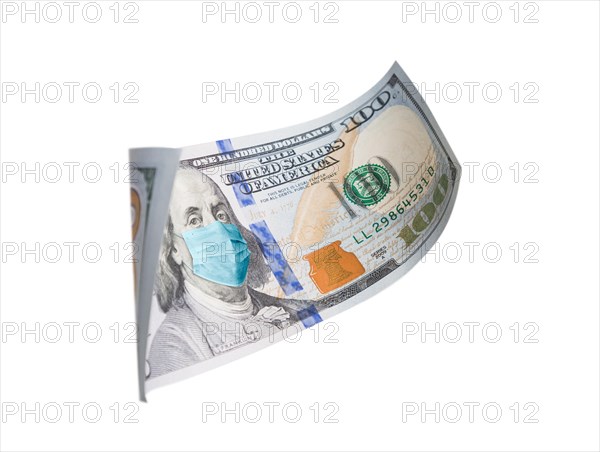 One hundred dollar bill with medical face mask on benjamin franklin isolated on white