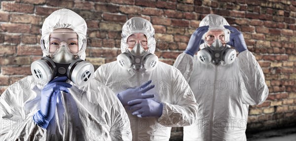 Chinese and caucasian woman and men in gas masks