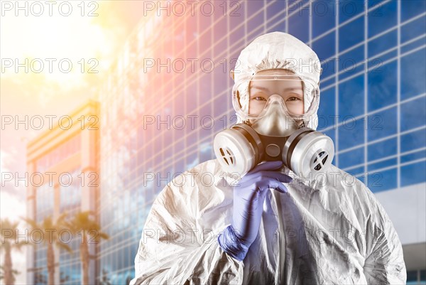 Chinese woman wearing hazmat suit