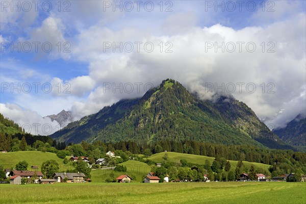 View from the Lorettowiesen to the mountain Riefenkopf 1748 m with low clouds