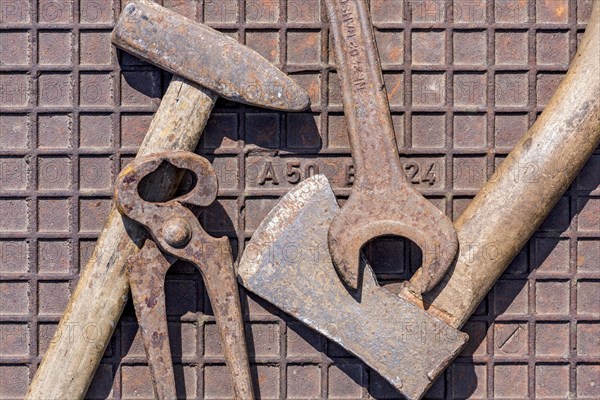 Old tool with hammer