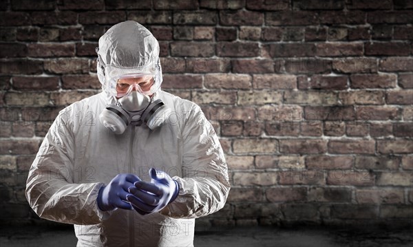 Man wearing hazmat suit