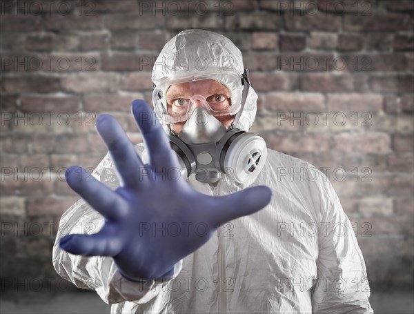 Man wearing hazmat suit