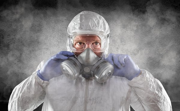 Man wearing hazmat suit