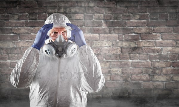 Man wearing hazmat suit