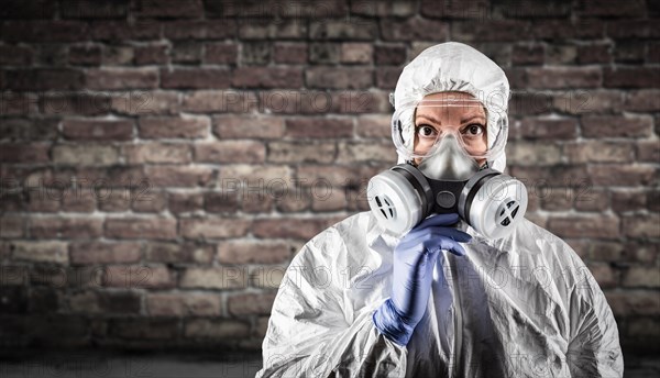 Woman wearing hazmat suit