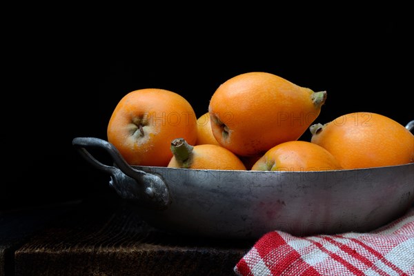 Ripe medlars in shell