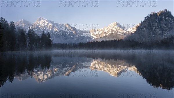 Alpine lake with reflection