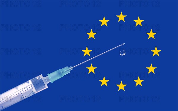 Symbol photo syringe with vaccine and EU stars