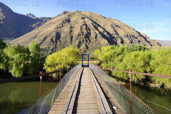 Suspension bridge over the Rio Urubamba