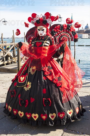 Woman in carnival constume and mask on carnival in Venice