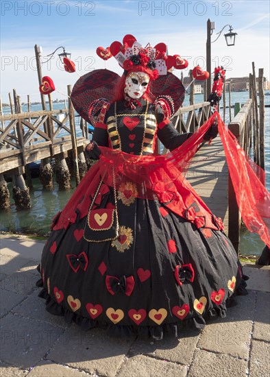 Woman in carnival constume and mask on carnival in Venice
