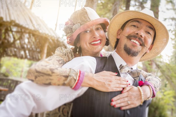 Attractive 1920s dressed romantic couple flirting outdoors