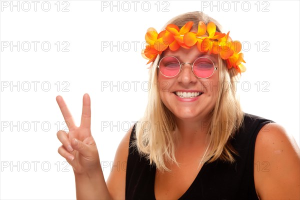 Beautiful smiling hippie girl with peace sign isolated on a white background