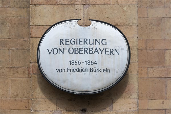 Info sign on the building of the government of Upper Bavaria