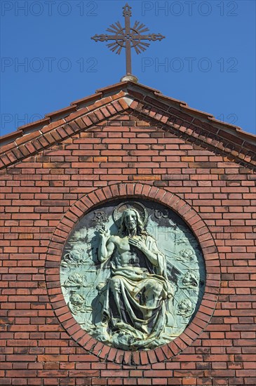 Relief of Christ at the entrance gate to the East Cemetery