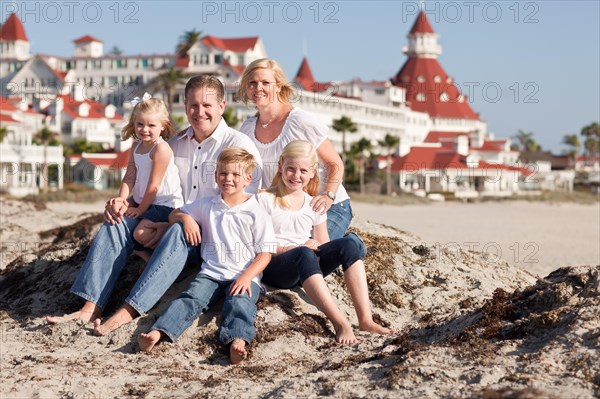 Happy caucasian family in front of hotel del coronado