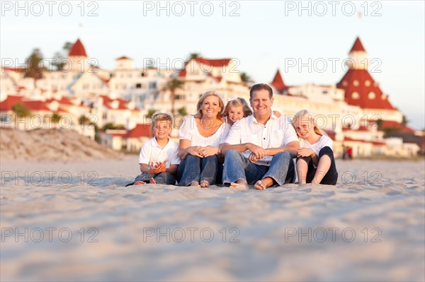 Happy caucasian family in front of hotel del coronado