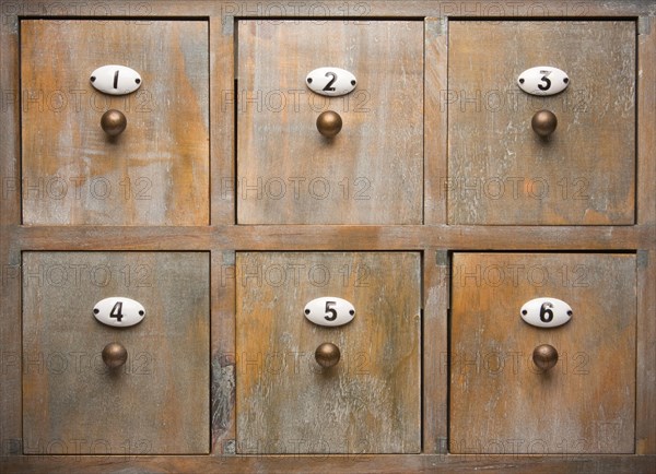 Antique wood filing cabinet drawers image