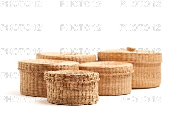 Various sized wicker baskets isolated on white