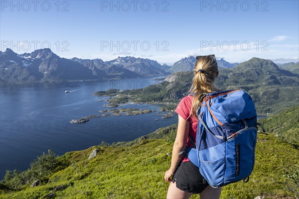 Young hiker standing on rocks