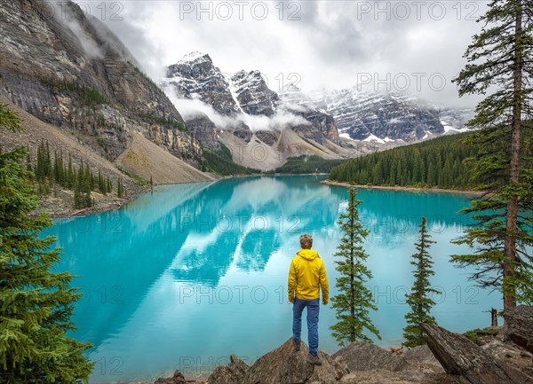 Young man looking at mountains