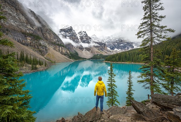 Young man looking at mountains