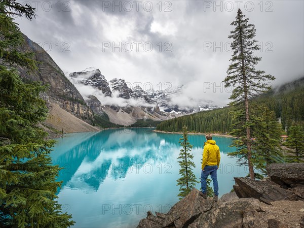 Young man looking at mountains