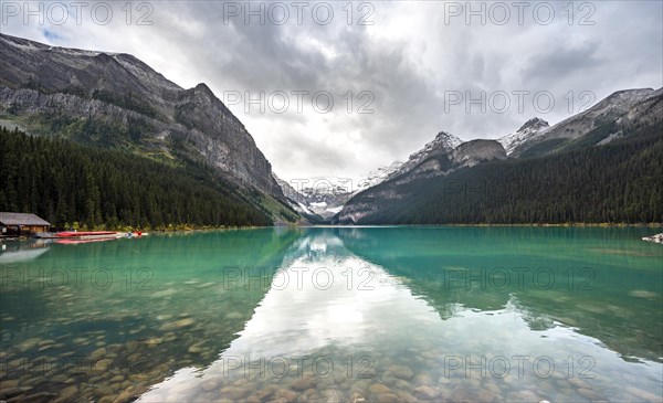 Mountains reflected in turquoise lake