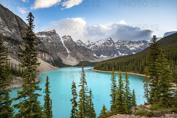 Mountain range behind turquoise glacial lake