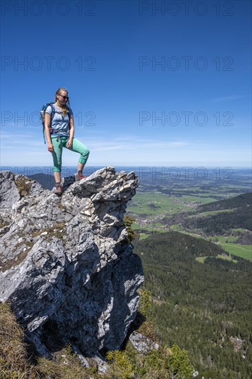 Hiker on the summit of Breitenstein