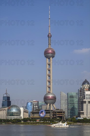 View over the Huangpu River to the skyline of the special economic zone Pudong with Oriental Pearl Tower