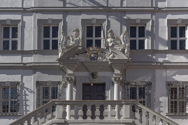 Entrance potrtal of the Iphofen town hall with the coat of arms of the Wuerzburg prince bishop Johann Philipp von Greiffenclau