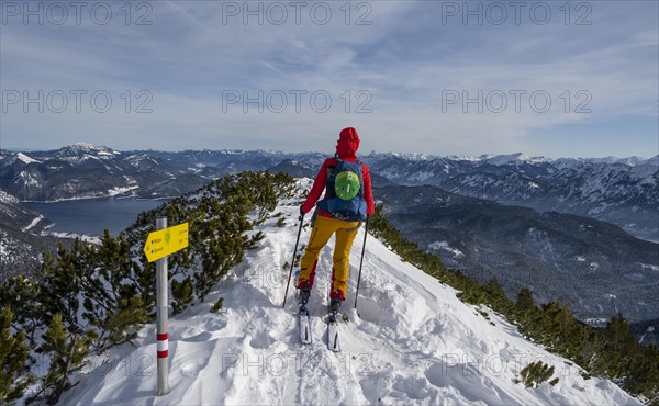 Young woman on ski tour