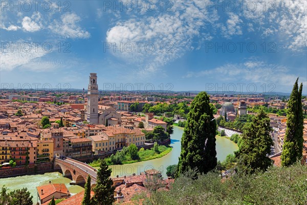 City view Verona with the stone bridge Ponte Pietra and the river Adige