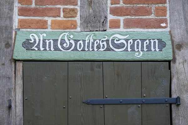 Half-timbered house in the round village of Satemin