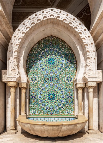 Ornate fountain with mosaic and ornament