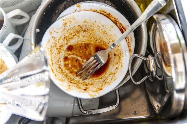 Dirty dishes in a sink